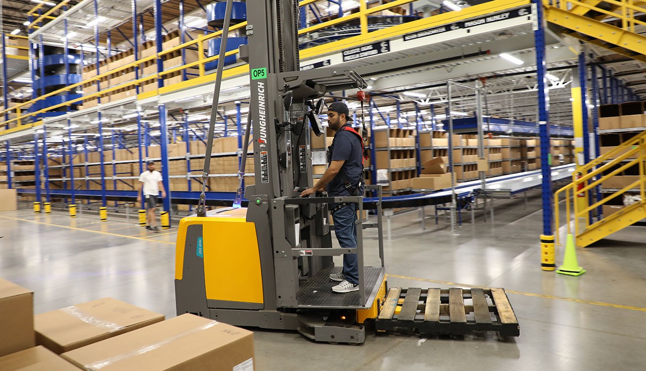 Man on Jungheinrich in warehouse