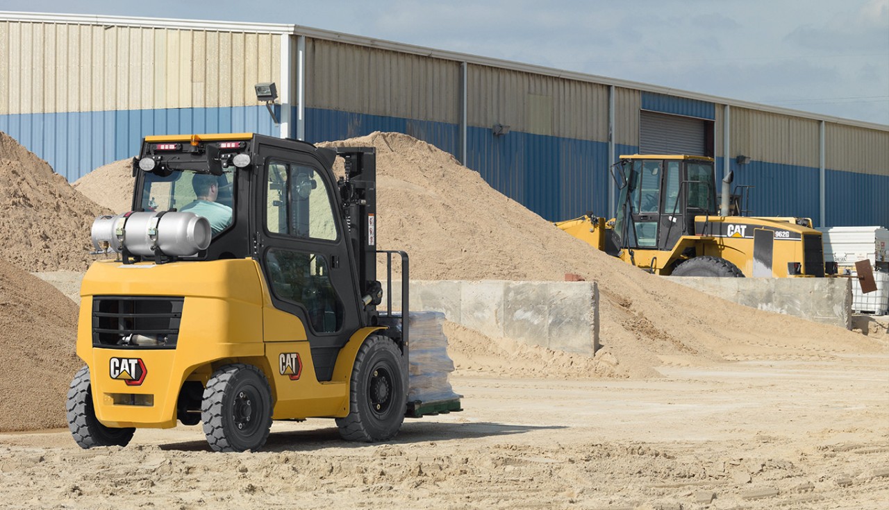 Cat forklift with construction equipment