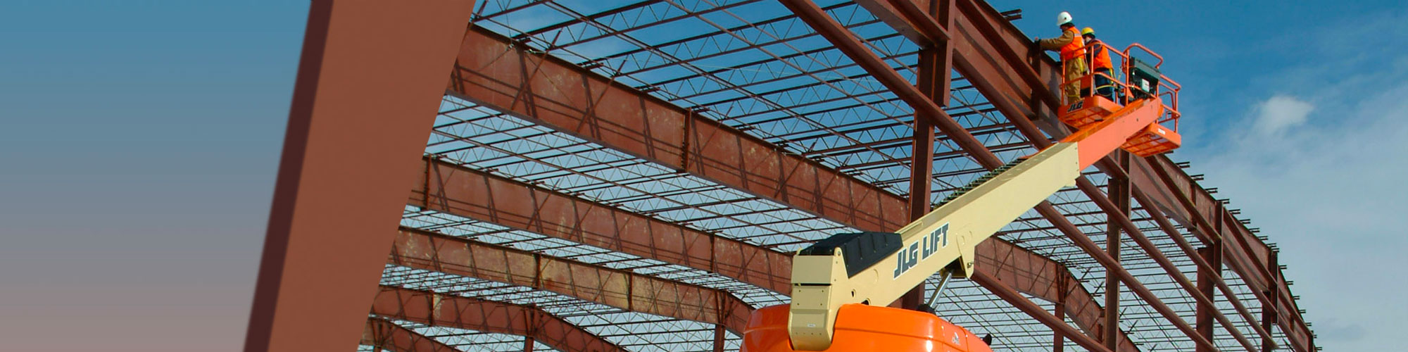 JLG telescopic boom used outside building construction