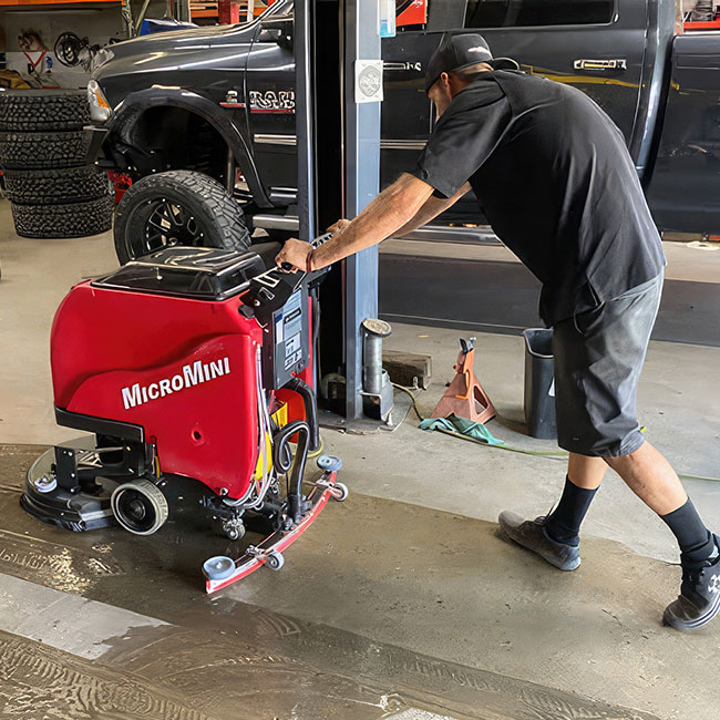 Factory Cat walk behind floor scrubber