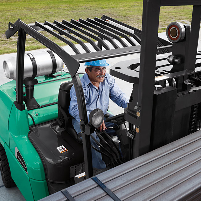 Man using a Mitsubishi Pneumatic forklift